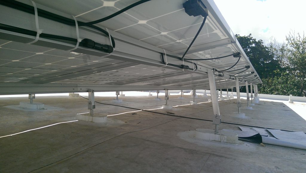 view of solar panel racking on a roof 