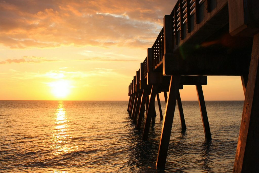 vero beach pier and water at sunrise
