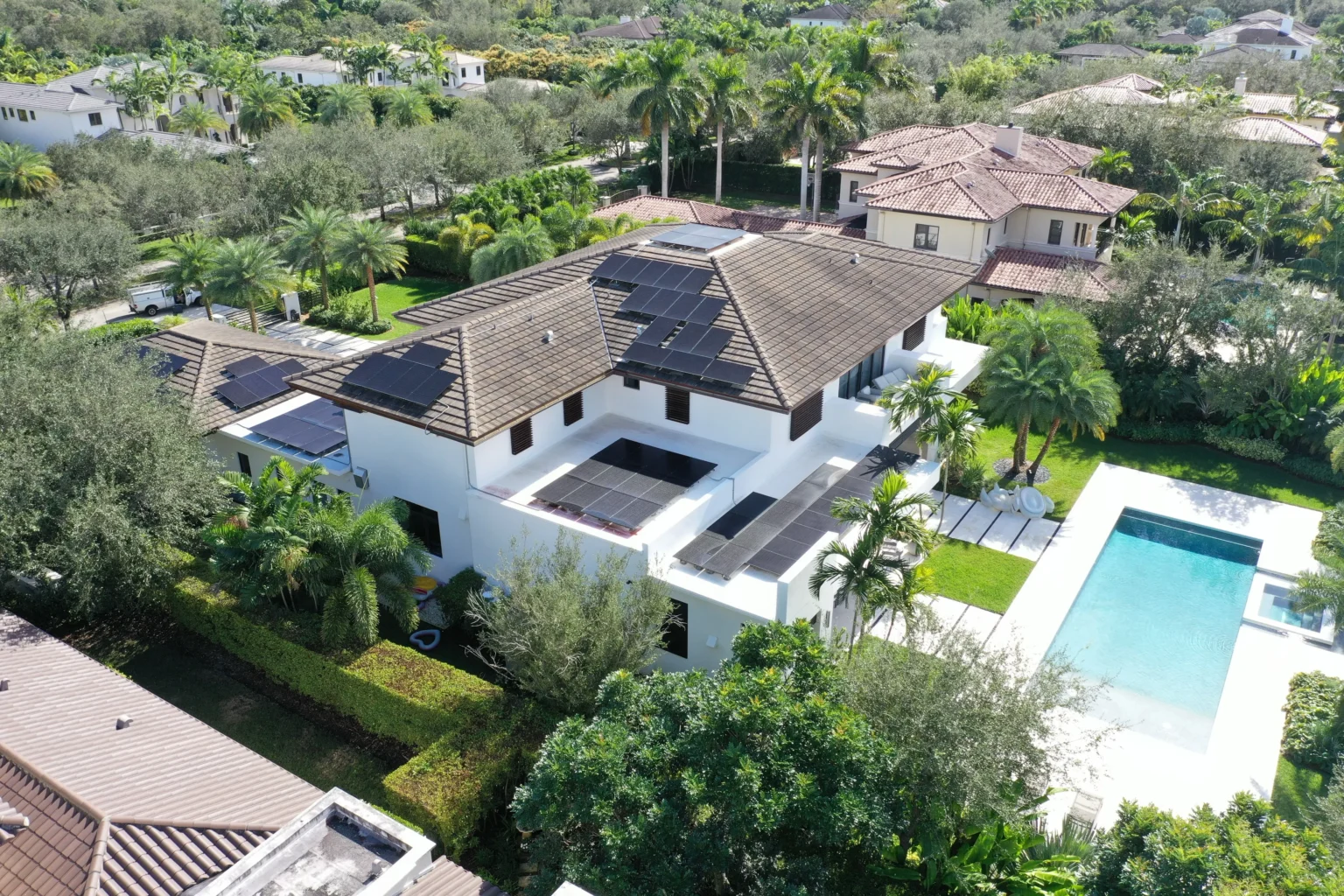 Florida home with a pool and rooftop solar panels