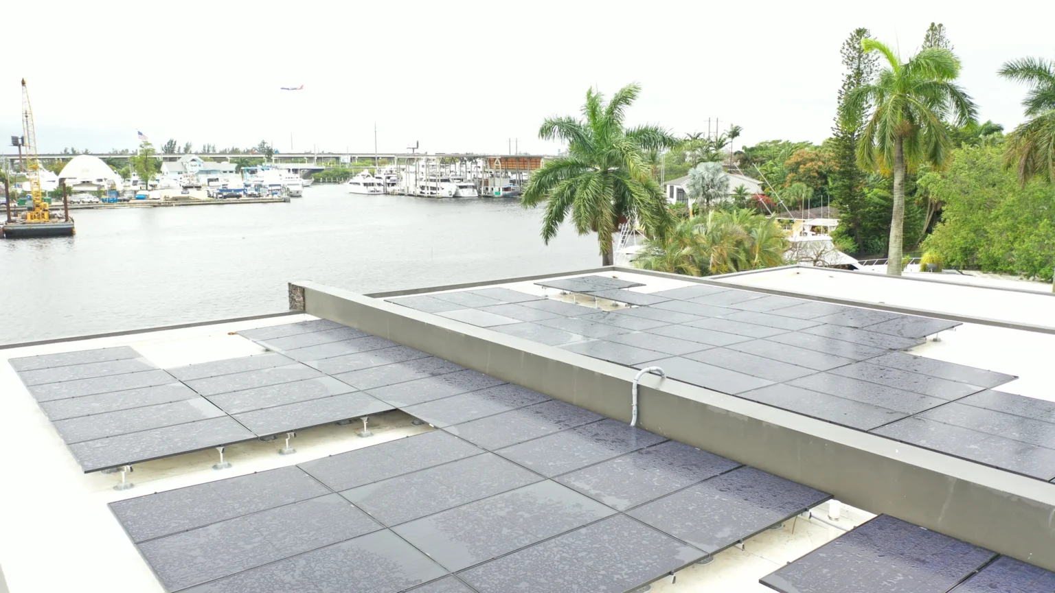 Solar panels on a waterfront Florida roof exposed to sun and salt air